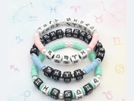 Cuentas plasticas cubo negro zodiaco blanco